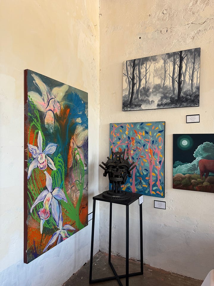 A selection of paintings and mixed media art.