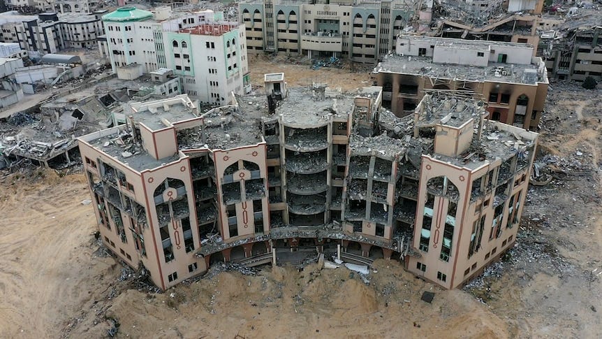 An aerial shot of destroyed buildings. An aerial shot of destroyed buildings.