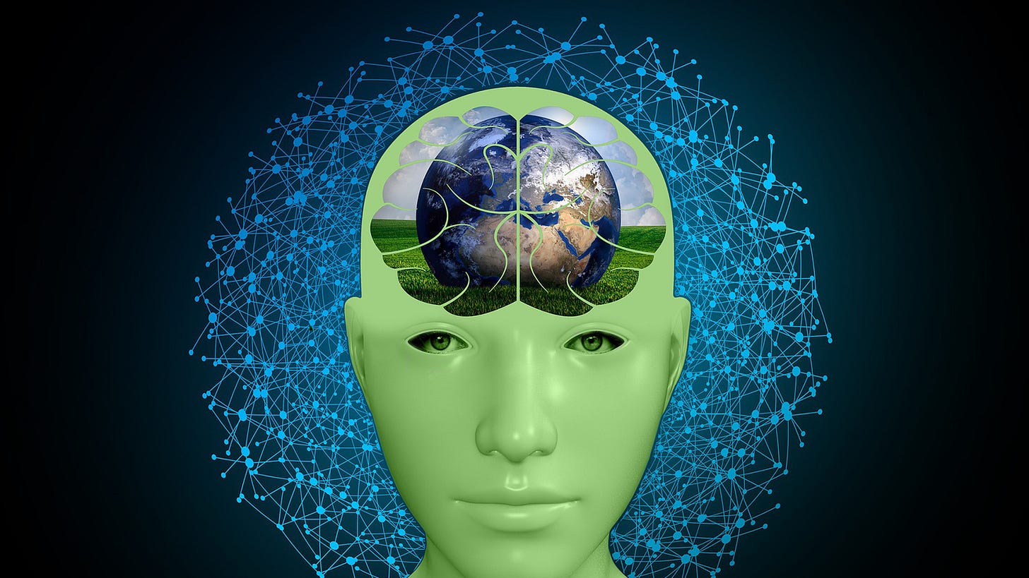 uma cabeça com o cerebro mostrando um planeta terra em cima de um campo verde