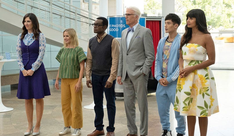 THE GOOD PLACE -- "Patty" Episode 412 -- Pictured: (l-r) D'Arcy Carden as Janet, Kristen Bell as Eleanor, William Jackson Harper as Chidi, Ted Danson as Michael, Manny Jacinto as Jason, Jameela Jamil as Tahani -- (Photo by: Colleen Hayes/NBC) THE GOOD PLACE -- "Patty" Episode 412 -- Pictured: (l-r) D'Arcy Carden as Janet, Kristen Bell as Eleanor, William Jackson Harper as Chidi, Ted Danson as Michael, Manny Jacinto as Jason, Jameela Jamil as Tahani -- (Photo by: Colleen Hayes/NBC)