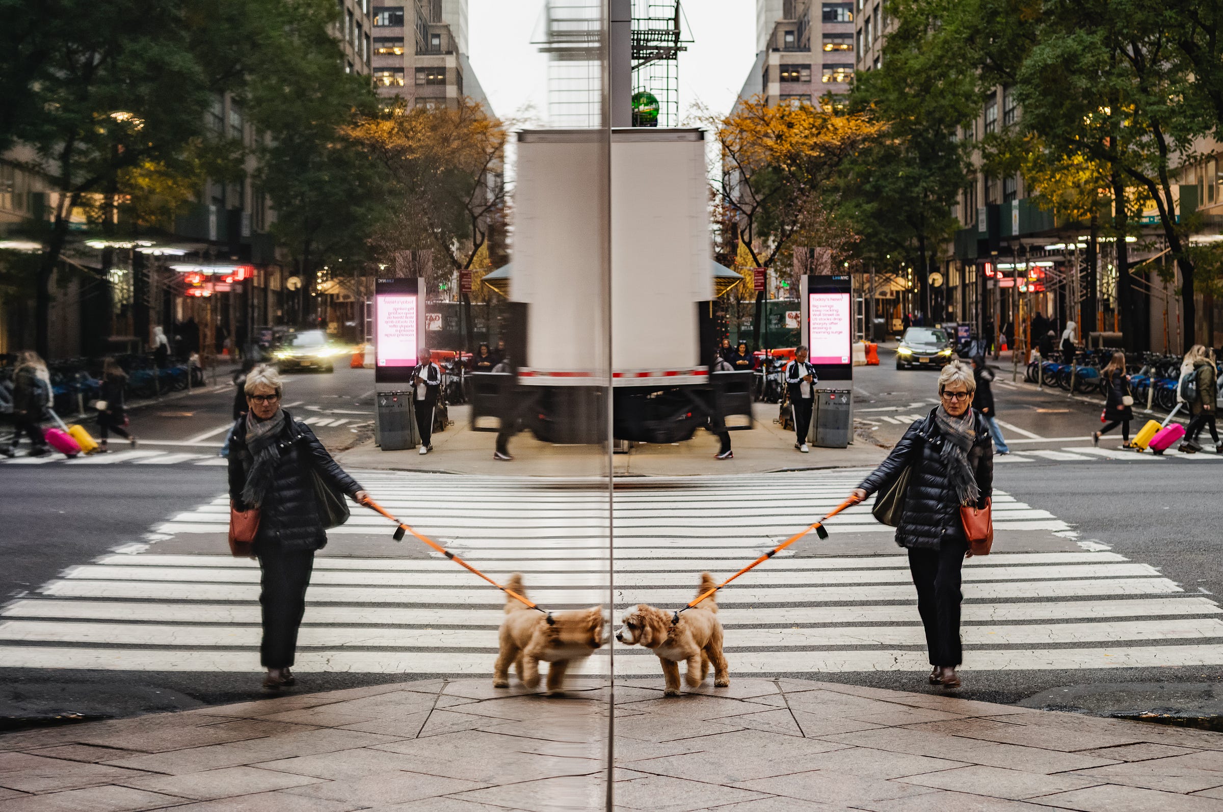 Reflection on East 45th Street, New York City. 1/45, ƒ/4.8, ISO 250, 50mm Reflection on East 45th Street, New York City. 1/45, ƒ/4.8, ISO 250, 50mm