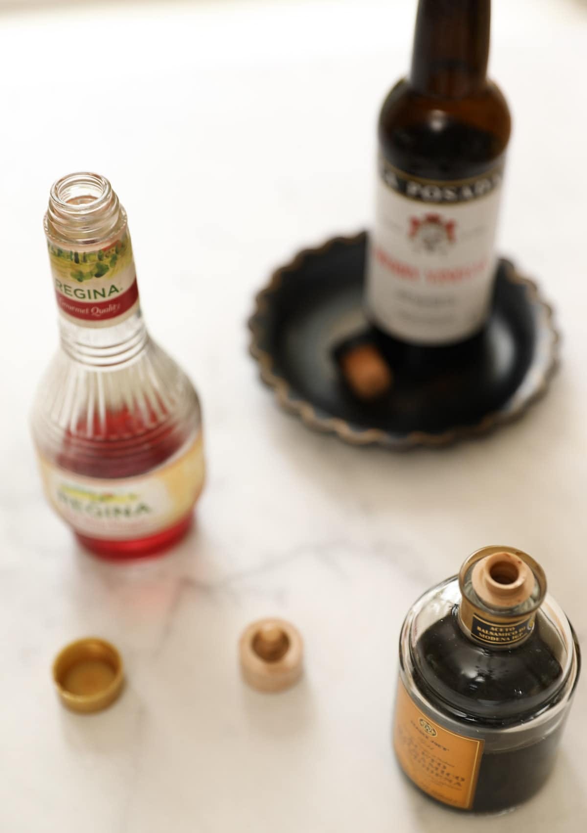 a selection a vinegars on a counter top