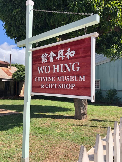 A collection of photos from Hawaii, including two whale tails rising from the water, a painted Maui mailbox, an historic museum in Lahaina, turtles on the beach, and the author enjoying a large burger in a location that's now likely burned.