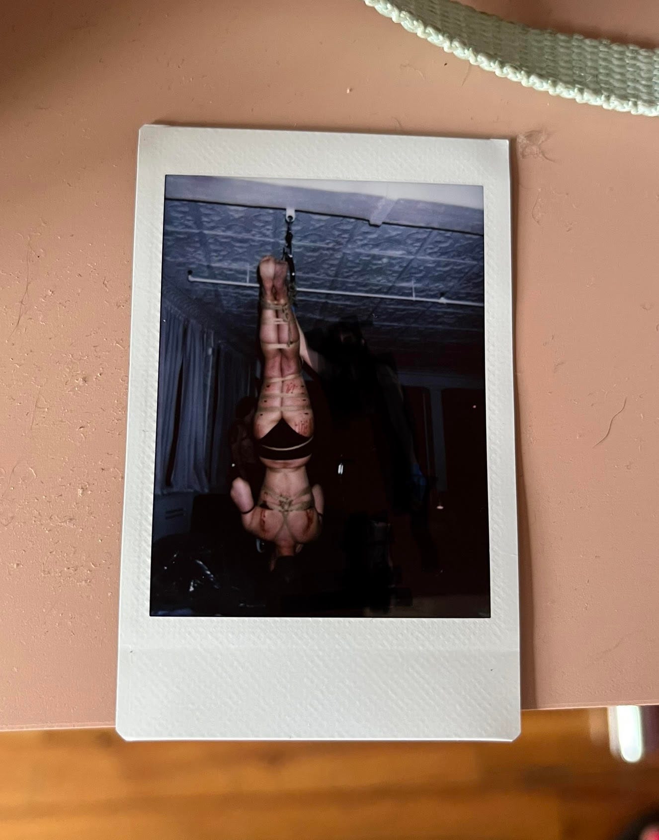 David suspended and bleeding with a friend