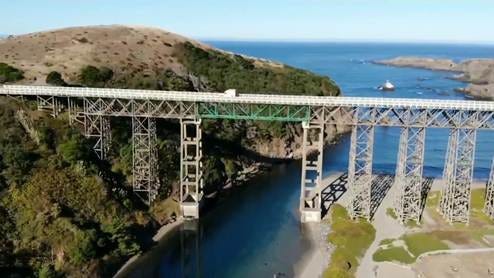 A bridge over a river

AI-generated content may be incorrect.