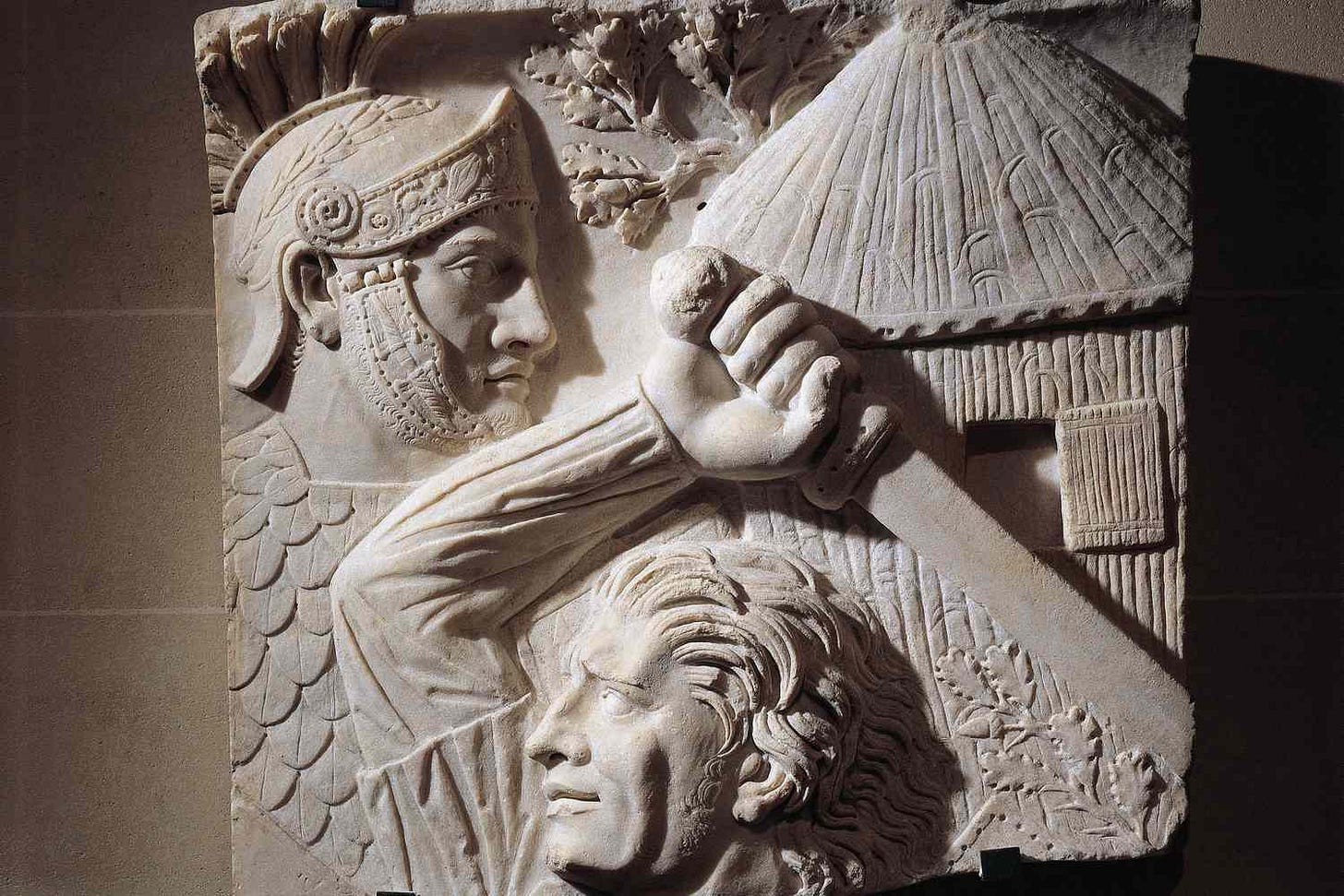 Marble relief representing a barbarian fighting against a Roman soldier (2nd century A.D.)