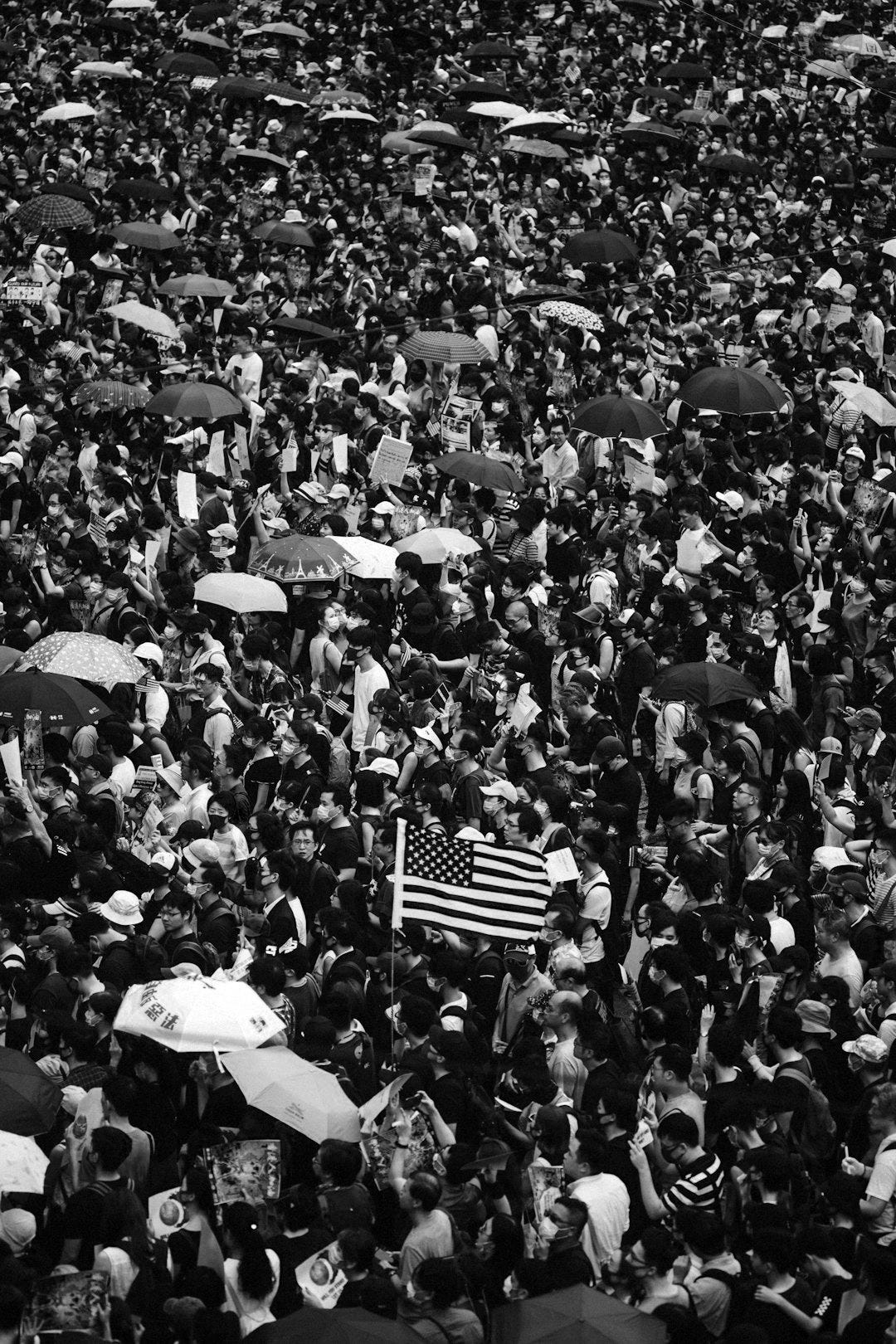 USA flag held by people USA flag held by people