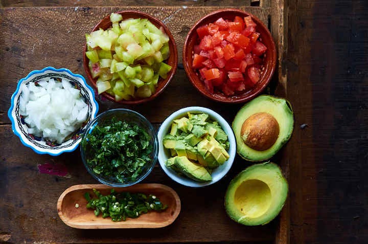 chopped pico de Gallo ingredients on table chopped pico de Gallo ingredients on table