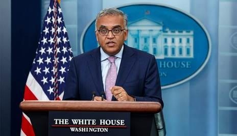Dr. Ashish Jha speaking at the White House press briefing podium Dr. Ashish Jha speaking at the White House press briefing podium