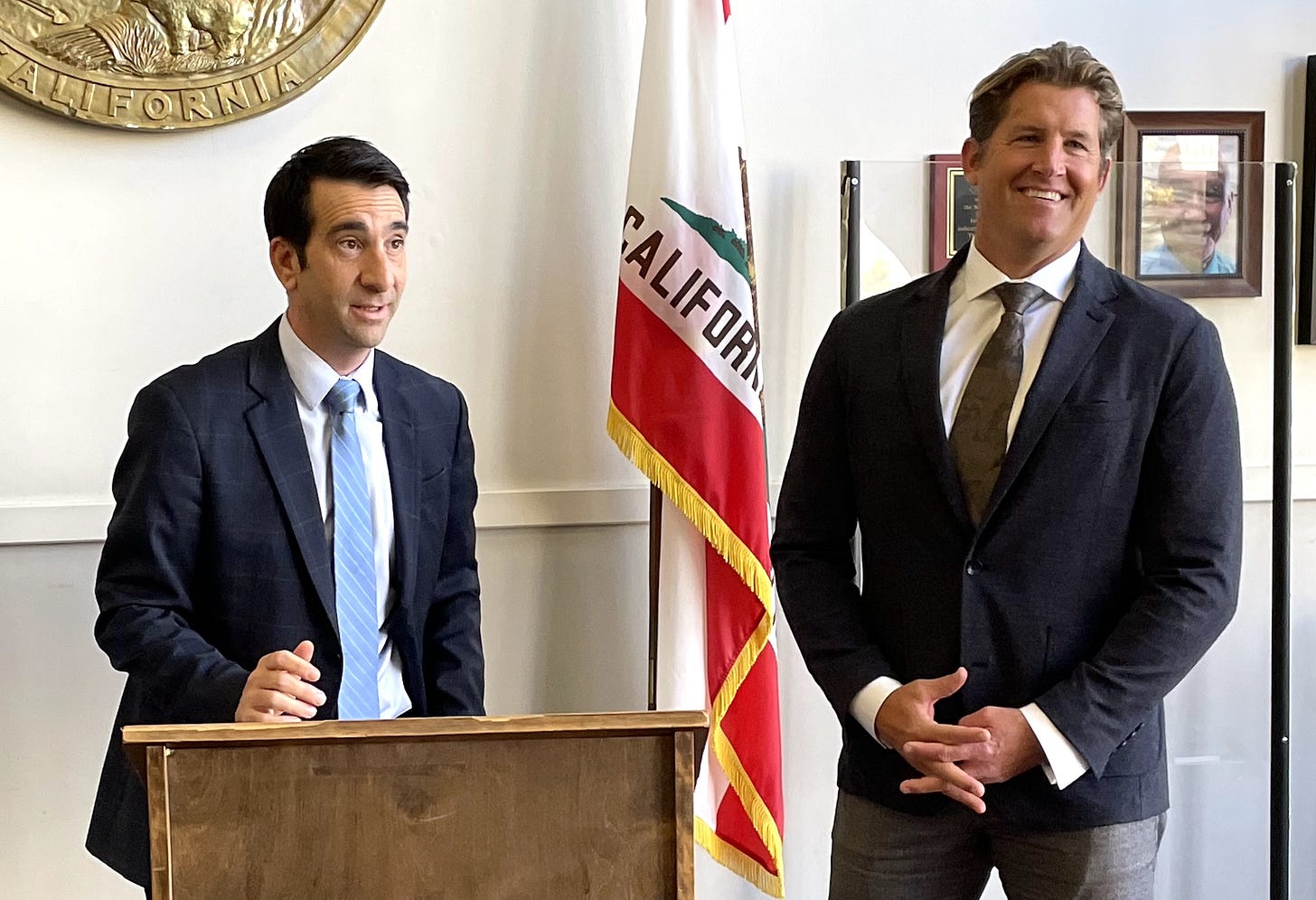 Attorney Isaac Blumberg, left, and Encinitas City Councilman Luke Shaffer are all smiles after a San Diego County judge suspended the criminal misdemeanor case against Shaffer on Monday at the Vista Courthouse. Steve Puterski photo