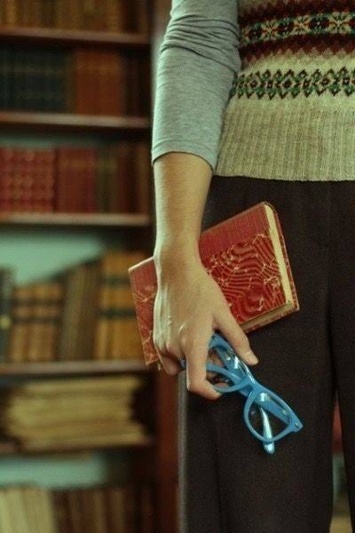 May be an image of studying and eyeglasses