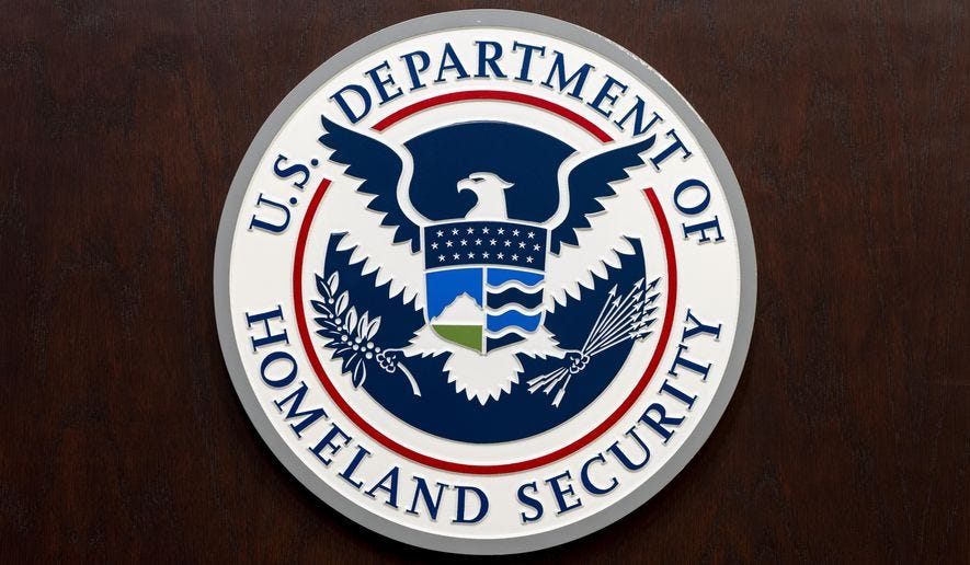 The Department of Homeland Security seal is seen on the podium at the Immigration and Customs Enforcement headquarters, Wednesday, April 9, 2025, in Washington. (AP Photo/Alex Brandon)