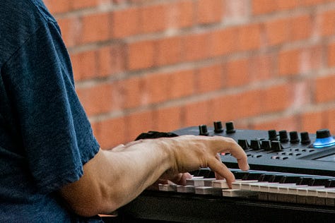 Images of Ian Clark playing heartfelt music with emotion