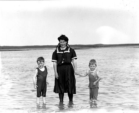 Jack cleaning fish as the boys look on ; Helen and the kids ; Helen knitting as children play at the Howard cottage