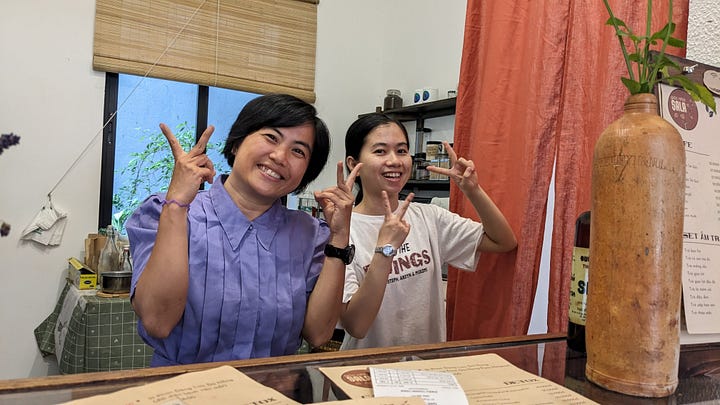 two lovely vietnamese women and their cafe