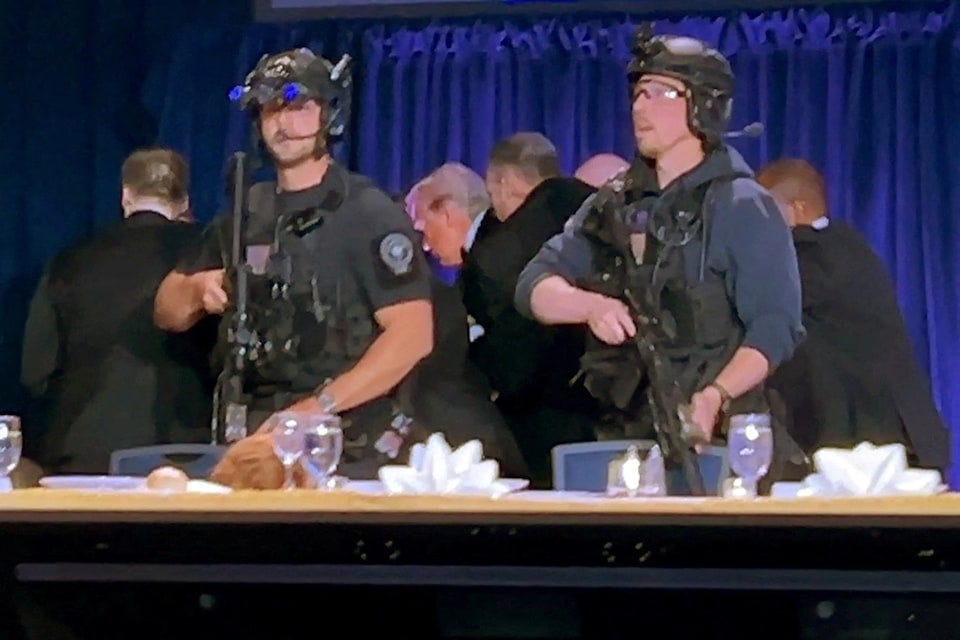 Secret Service agents draw weapons as chaos erupts at the White House Correspondents’ Dinner — April 25, 2026