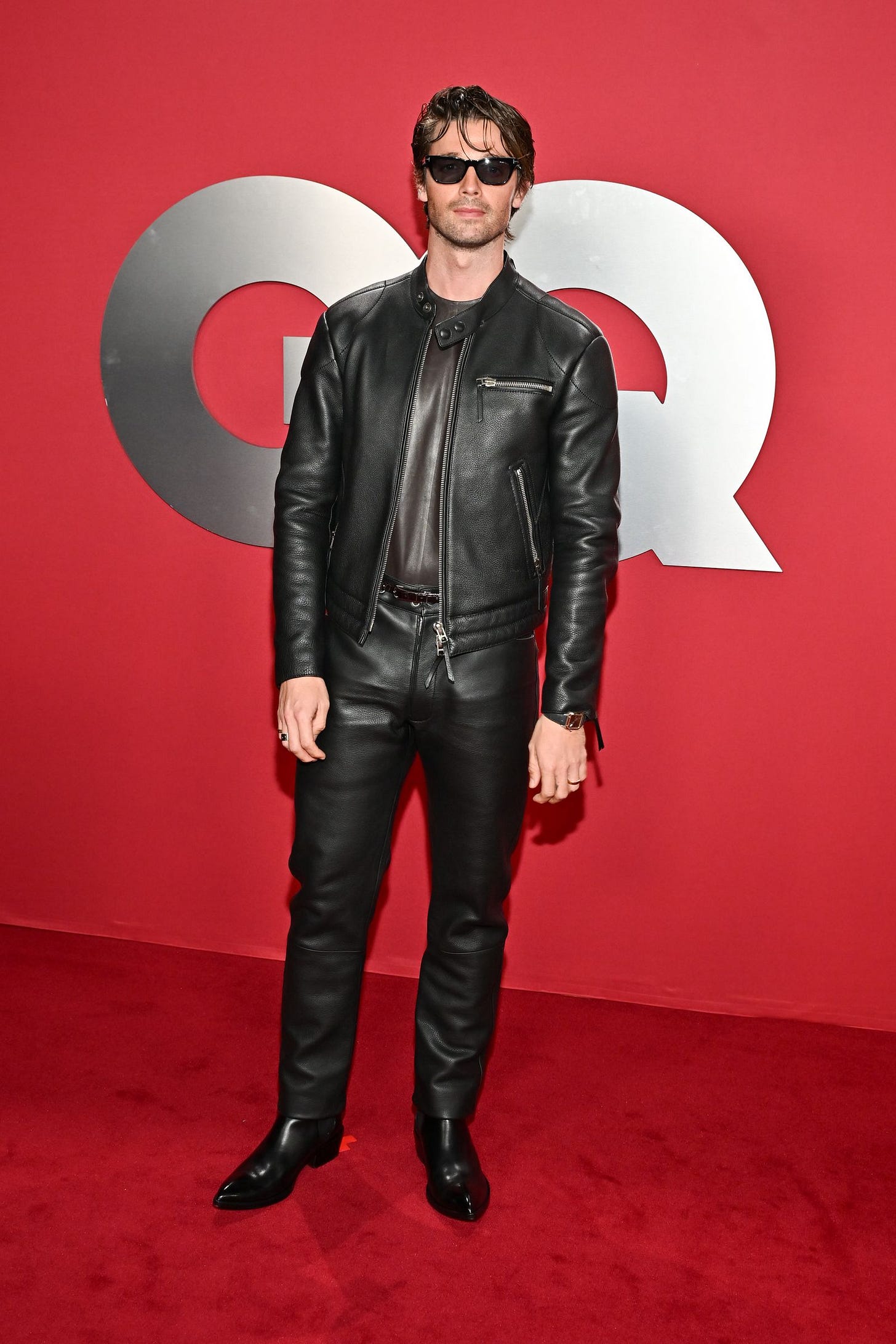 Patrick Schwarzenegger's Look Nodded to His Terminator Dad Arnold at GQ's  Men of the Year Party | GQ