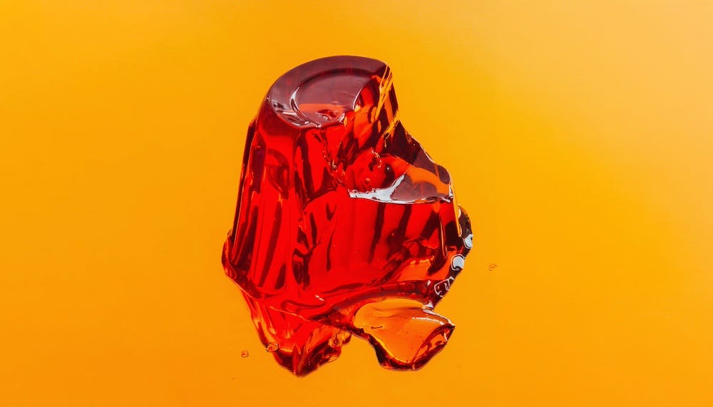 a melting cone of red gelatin