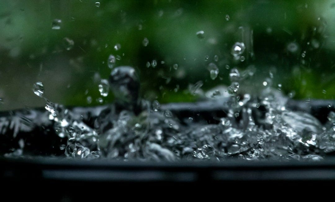 a close up of a window with water on it a close up of a window with water on it