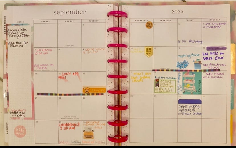My happy planner september spread that is rainbow color coded. 