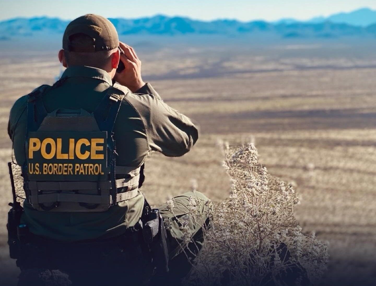 A US Border Patrol Agent keeps watch over the border with Mexico.