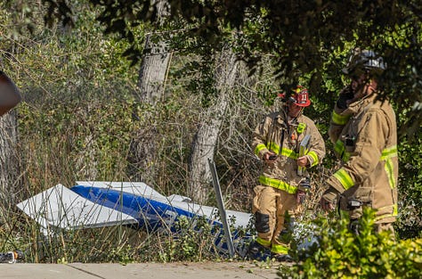 UPDATE: Video Shows Plane Being Towed Away After Crash Sparks Brush ...