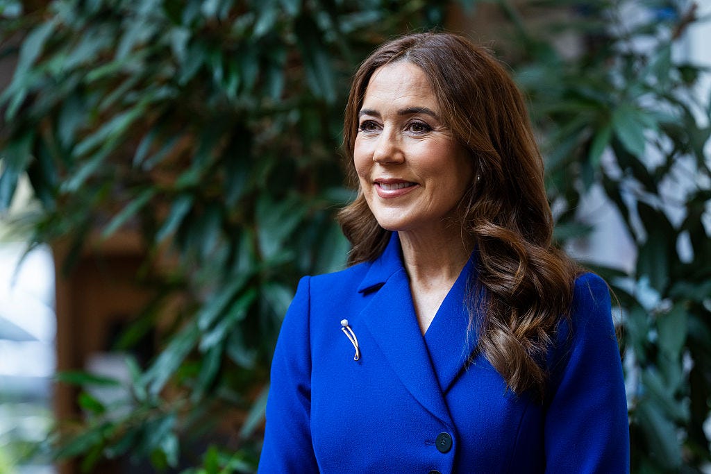 Woman in blue coat