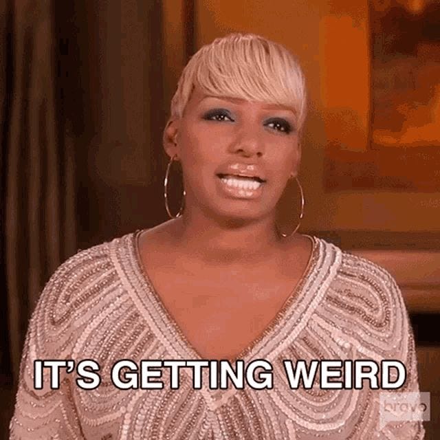 This may contain: a woman with blonde hair is smiling at the camera and has a quote on her face