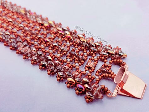 Photos of a beaded cuff bracelet in tones of copper and red with a bright copper box clasp