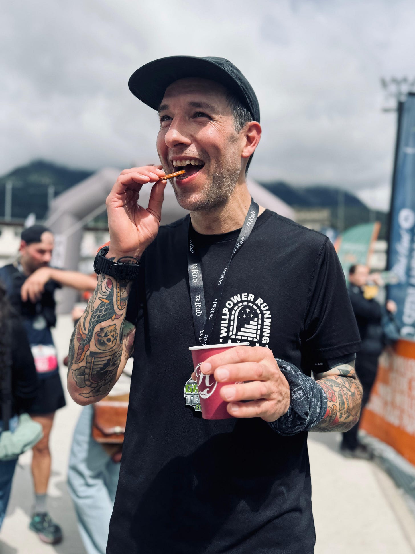 The author after a race eating salt pretzels