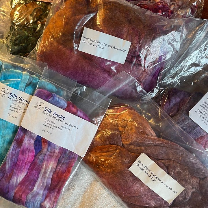 A lot of brightly coloured silk fiber for spinning