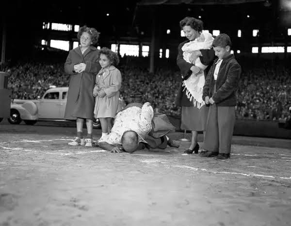 Charley Lupica kisses home plate at Cleveland Stadium. Charley Lupica kisses home plate at Cleveland Stadium.