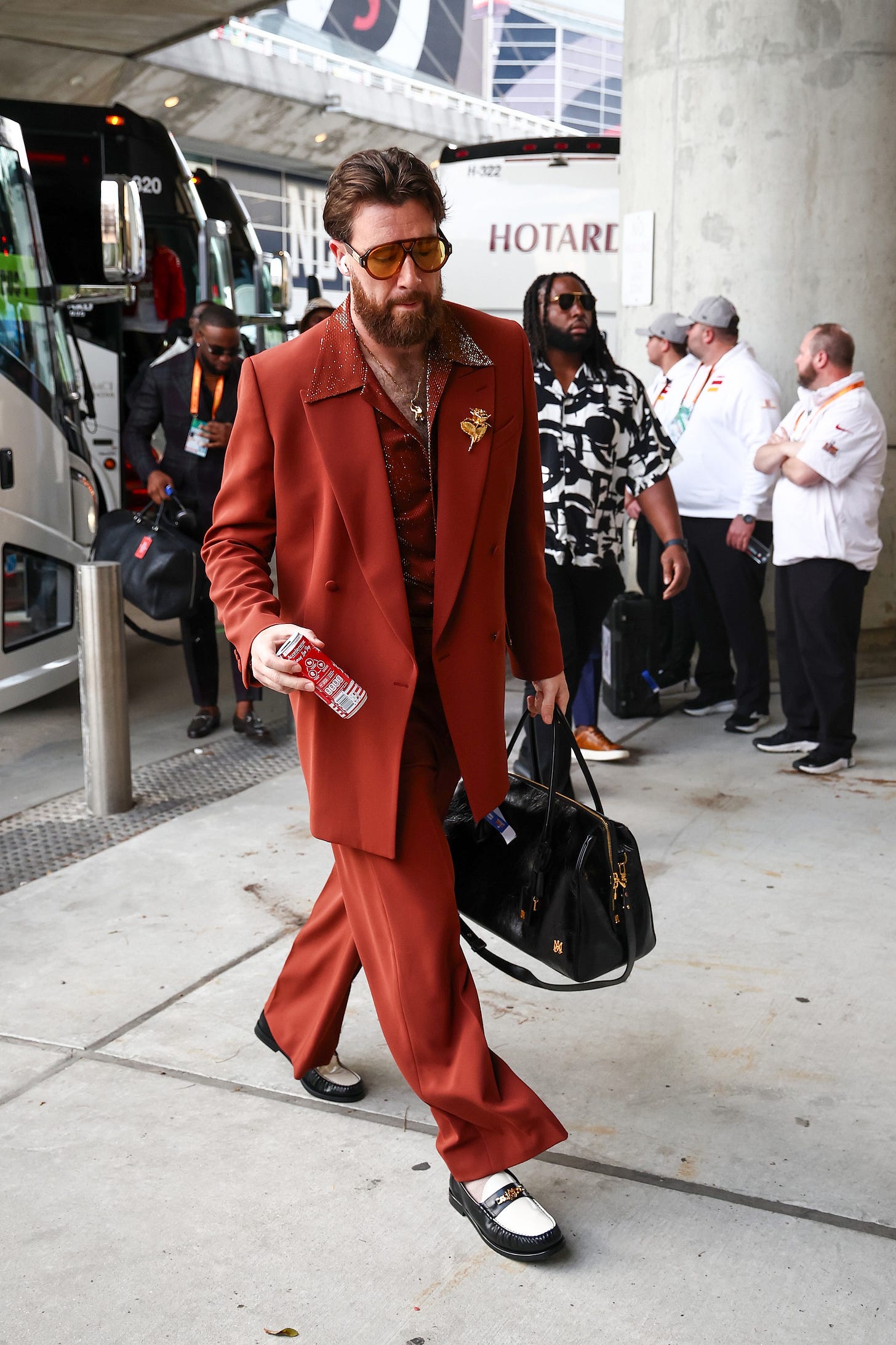 Travis Kelce's Pregame Super Bowl Outfit 2025 Is Amiri's Disco Suit