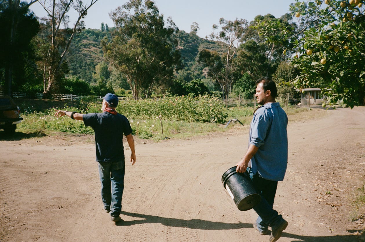 Alex Wesier and Balo Orozco on the farm