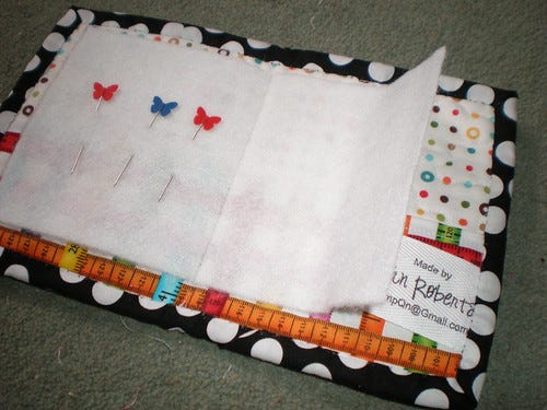 Inside of needlebook Inside of needlebook
