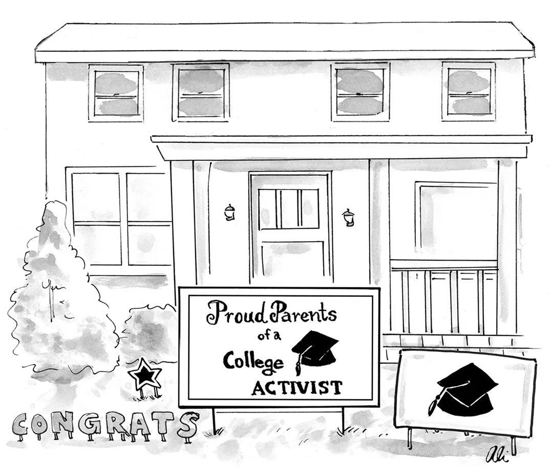A sign in front of a house reads “Congrats,” and another one says, “Proud parents of a college activist.”