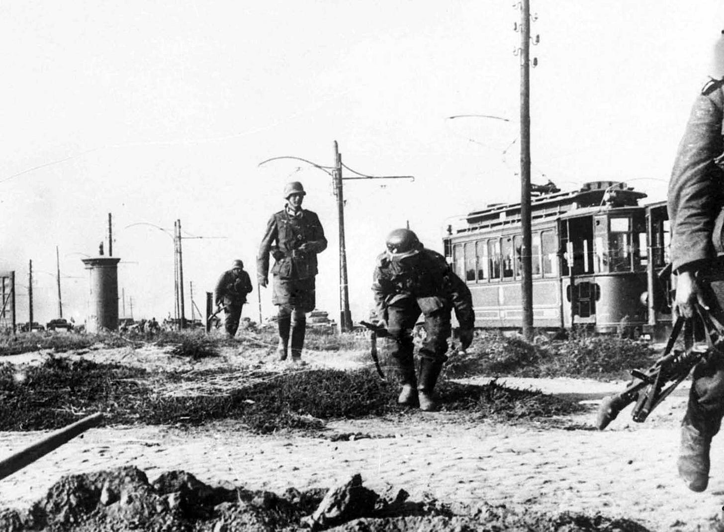 German infantry cautiously advancing on the outskirts of Warsaw, Poland, on September 16, 1939, as the capital braced for siege. German infantry cautiously advancing on the outskirts of Warsaw, Poland, on September 16, 1939, as the capital braced for siege.