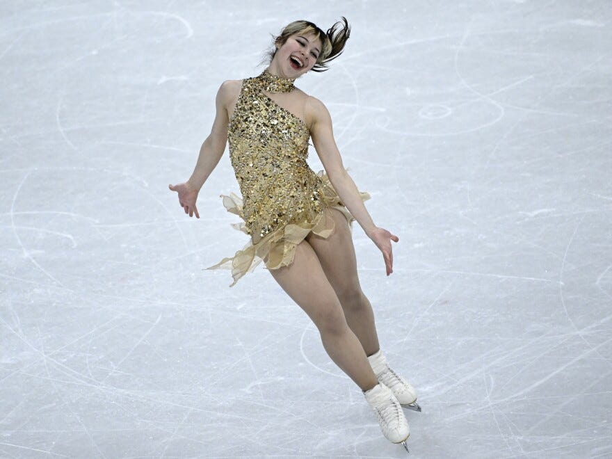 Alysa Liu and her striped ponytail soared during Thursday's program, which put her permanently in first place.