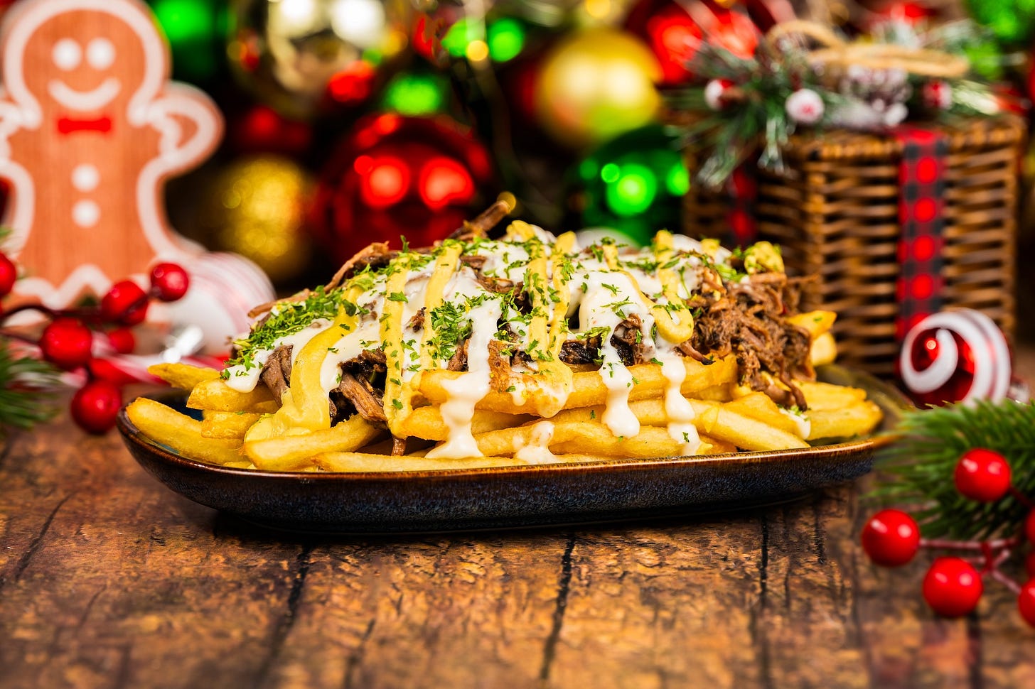 Holiday Pot Roast Loaded French Fries topped with pot roast, beer-cheese sauce, crispy onions, and horseradish mustard