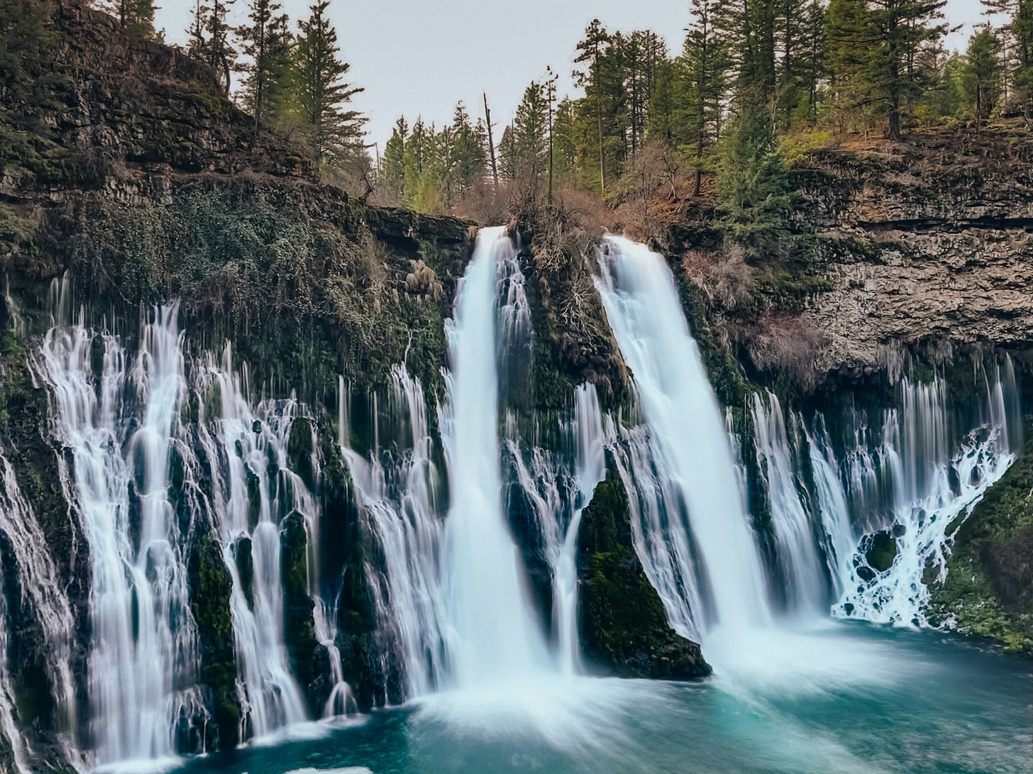 A waterfall near the Pacific Crest Trail in the northern Sierra Nevada mountains in California. A waterfall near the Pacific Crest Trail in the northern Sierra Nevada mountains in California.