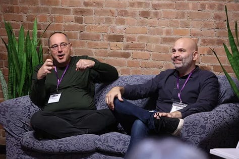 Meghan Daum hosting an Unspeakeasy retreat weekend in New York City with attendees in conversation around a table