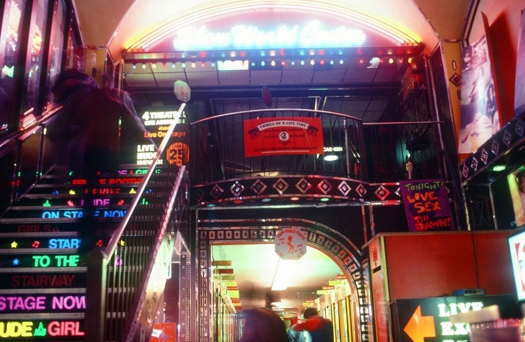Show World’s neon lit cave. One of my favorite of Annie Sprinkle’s photos.