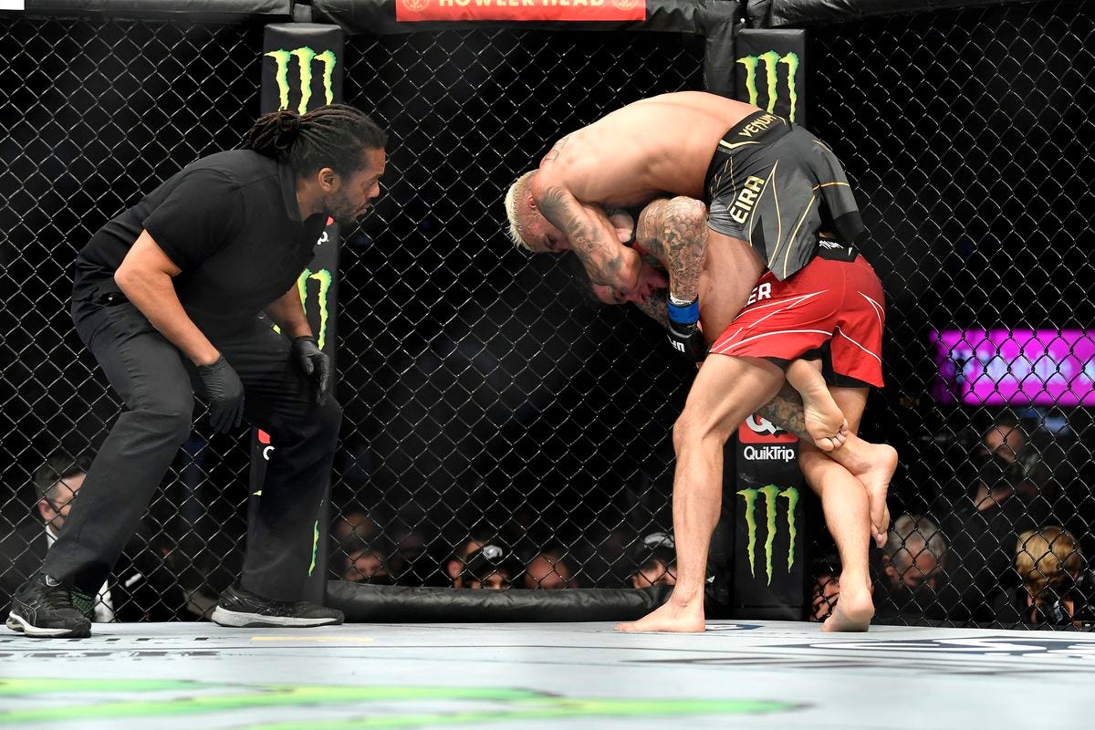 Charles Oliveira finishes Dustin Poirier with standing rear-naked choke to  retain lightweight title in UFC 269 main event - MMA Fighting