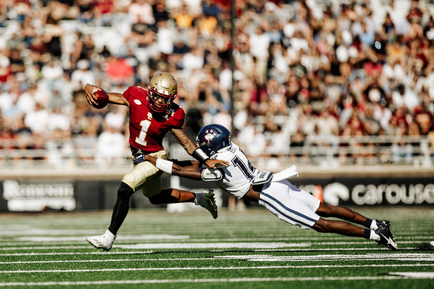 Thomas Castellanos runs out of a tackle.