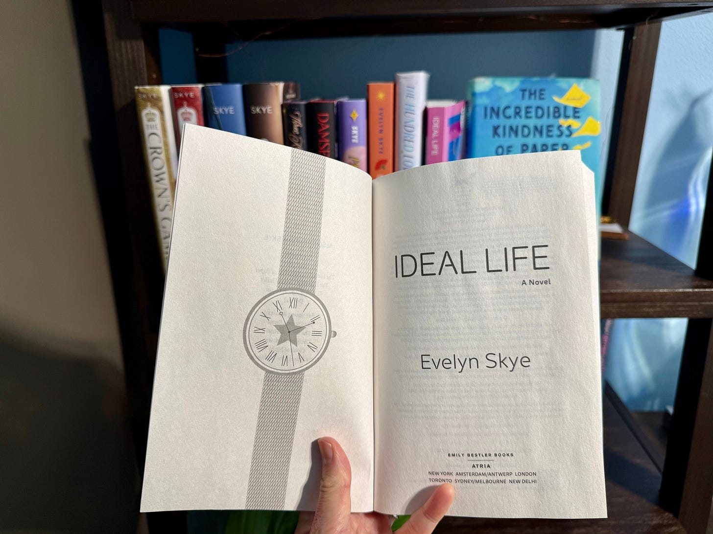 inside first pages with illustration of a watch with a star in the center inside first pages with illustration of a watch with a star in the center