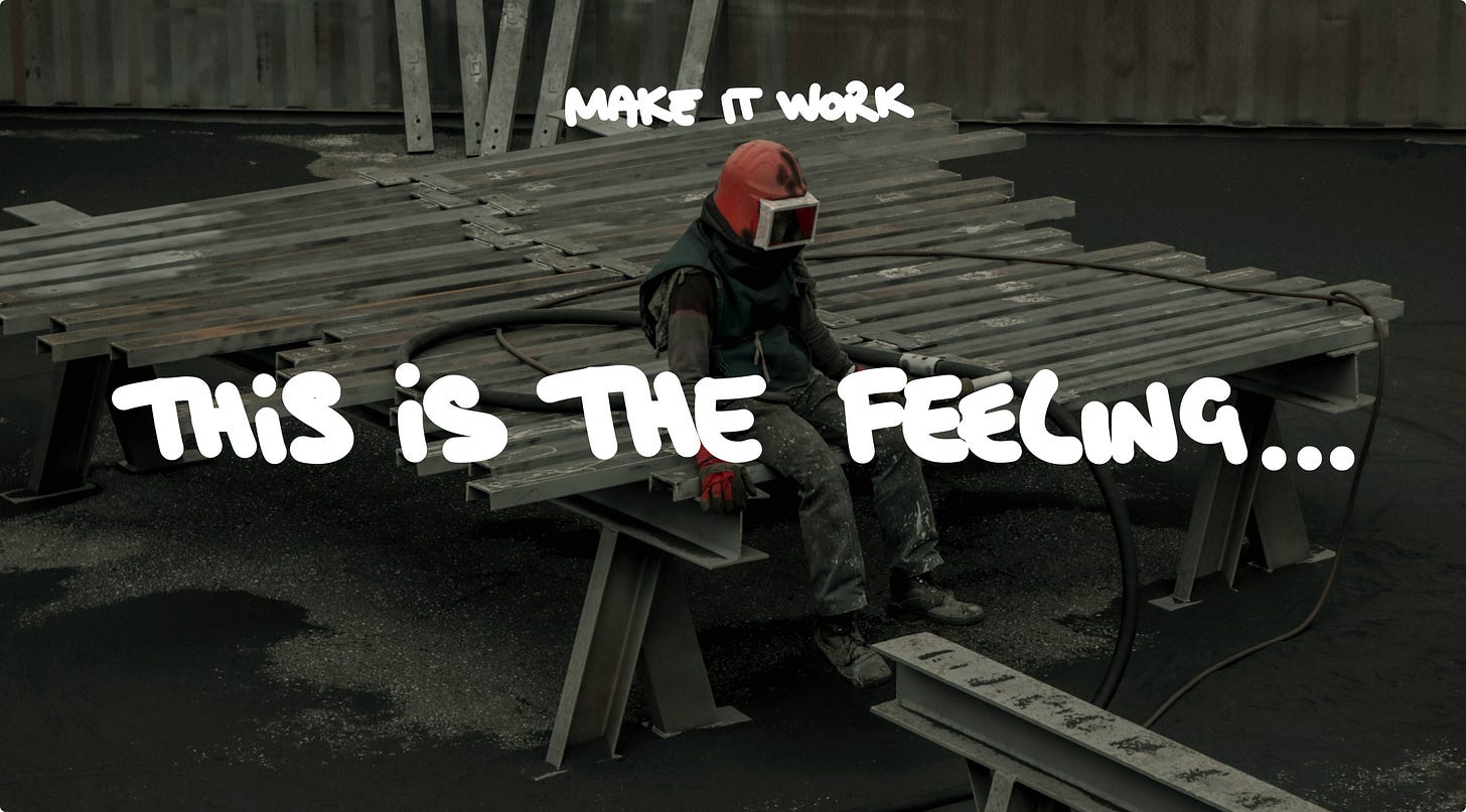 Worker sitting alone on a metal structure at an industrial site.
