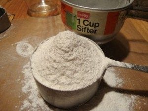 Flour Sifted in Cup - Greg Patent illustration