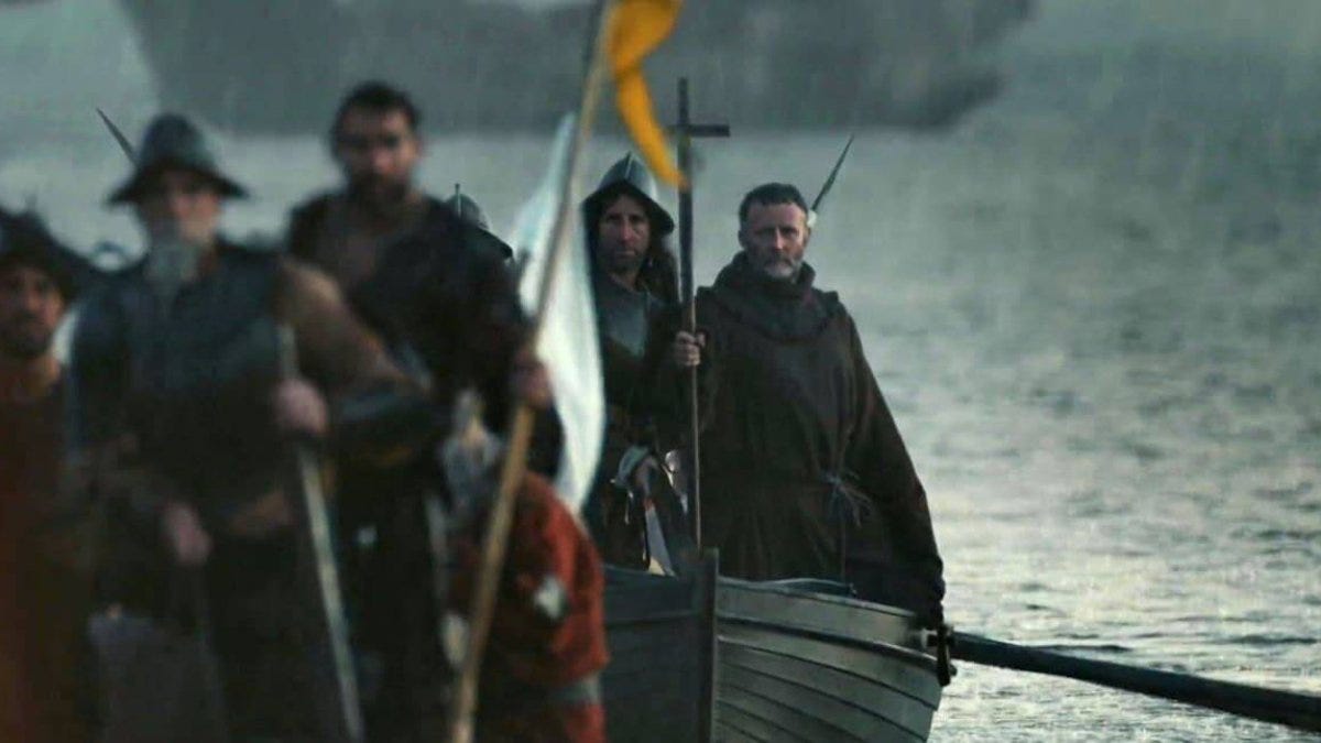 Spanish shore party approaching with a raised cross in Apocalypto