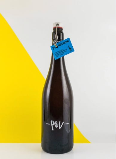 Dark bottle with P&V logo on the front.