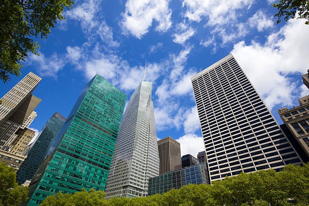 Bryant Park Skyscrapers "Midtown Manhattan highrise buildings as seen from Bryant Park, New York" wr grace building stock pictures, royalty-free photos & images